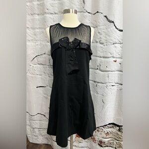 Corey Lynn Carter Elegant Little Black Dress Sleeveless Bow Sheer Neckline Party
